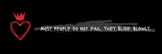 Individual standing still in a quiet moment of decision, symbolising clarity, discipline and resistance to drift